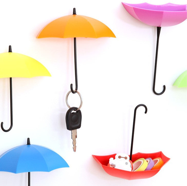 Set of three umbrella hooks, red, pink yellow