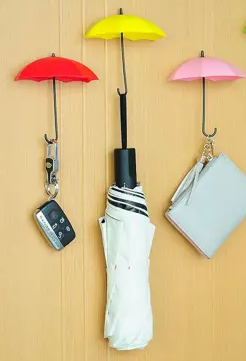 Set of three umbrella hooks, red, pink yellow